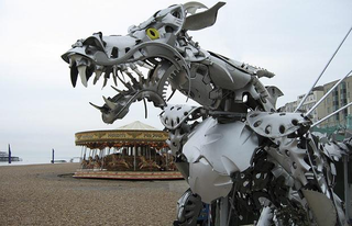 Illustration for article titled Hubcap Sculptures Make Robot Pets